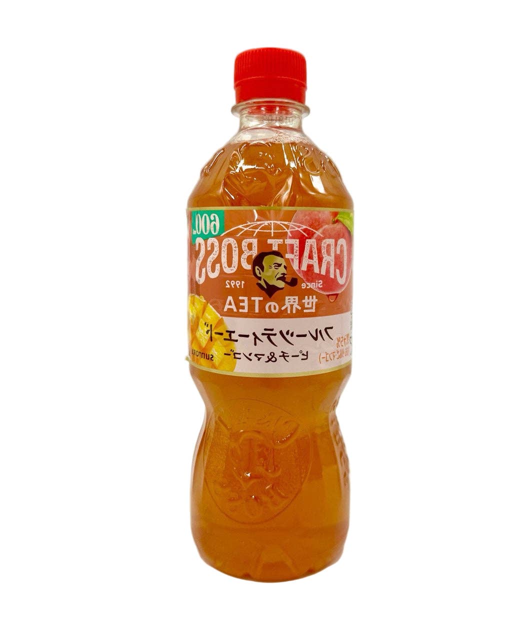 Bottle of orange-colored beverage with a red cap on a white background